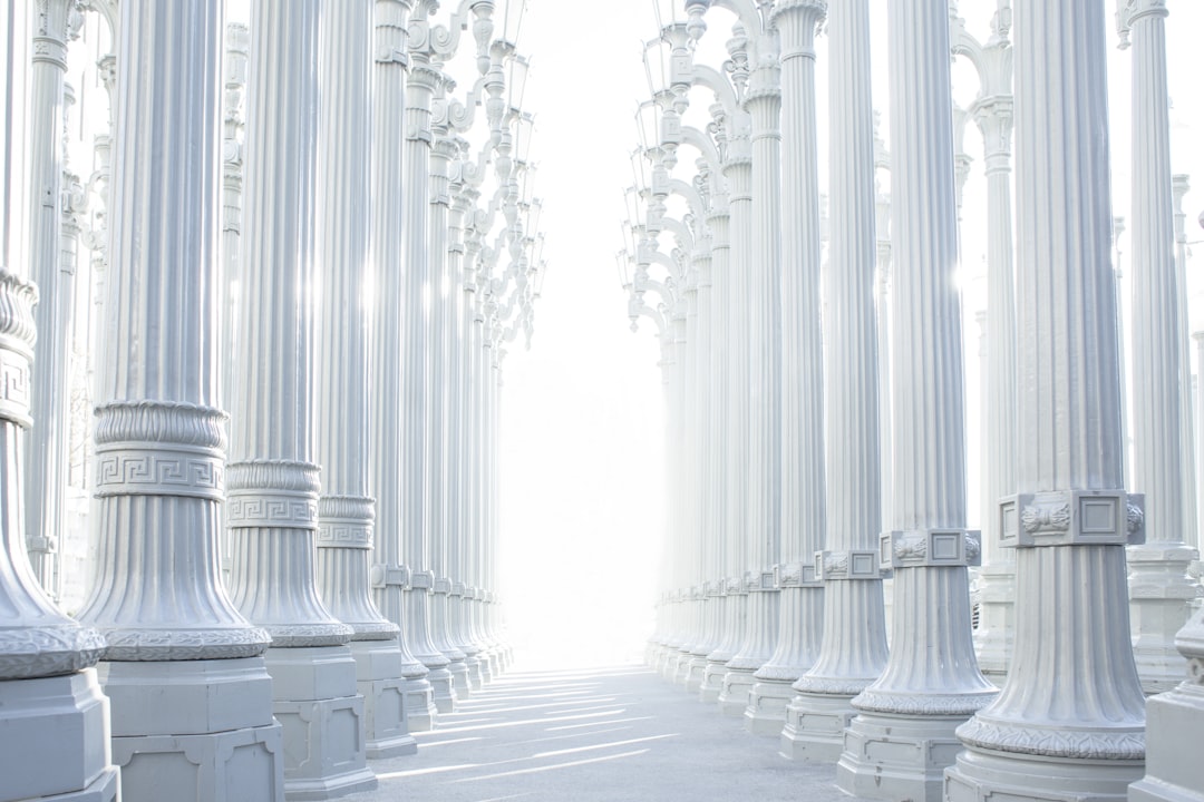 photography of white wall lot, Giant white pillars