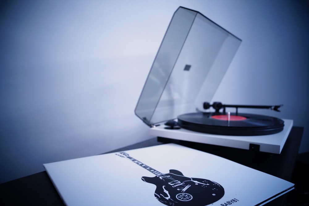 white and black vinyl turntable