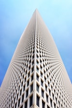 architectural and low-angle photo of white high rise building