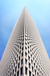 architectural and low-angle photo of white high rise building