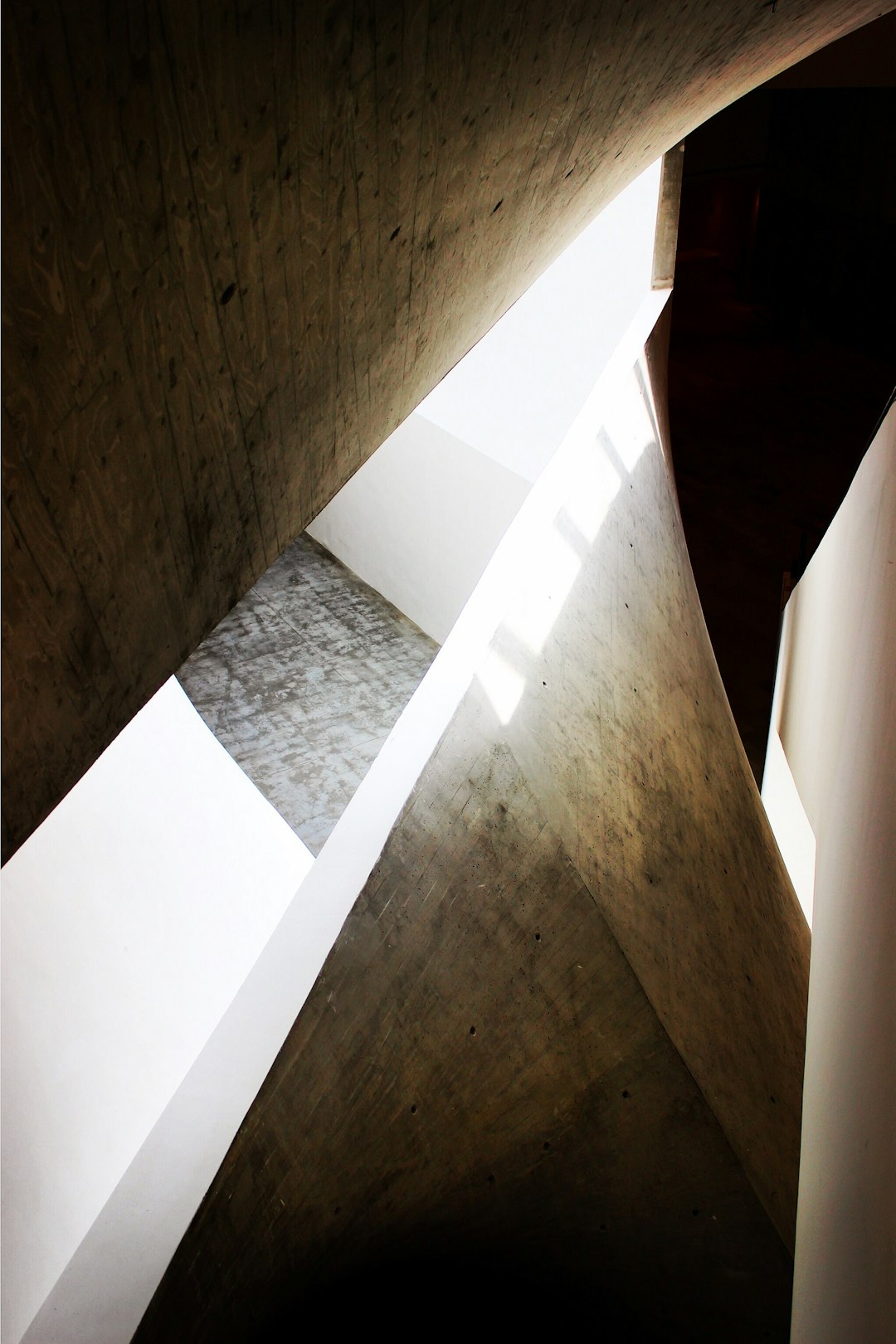 Edges of rocky architectural walls and designs reflecting light and casing shadows