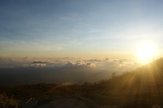 An inspiring sunrise over a mountain range symbolizing new beginnings.