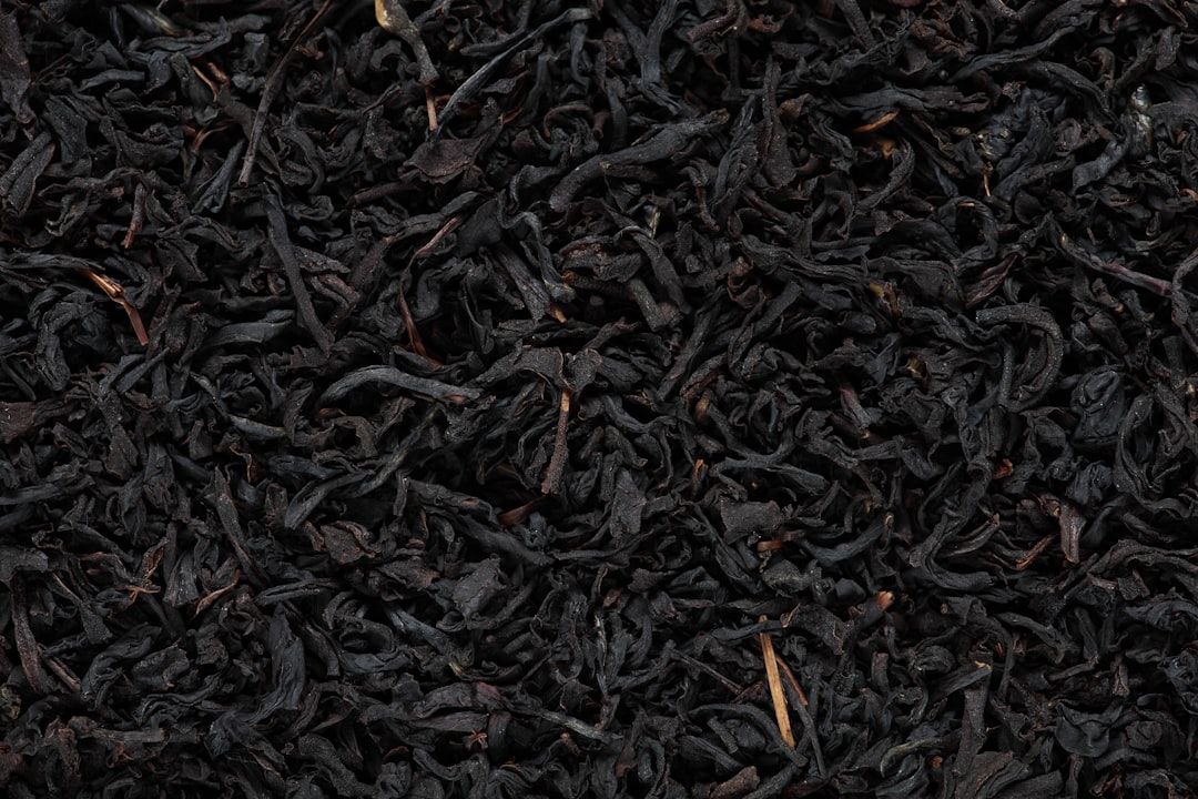 Blackened tea leaves