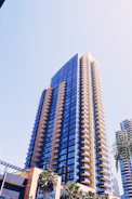 Modern high-rise building in Dubai Marina with glass balconies