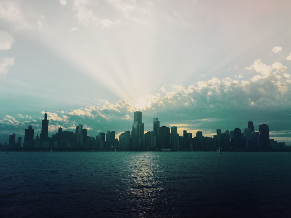 silhouette photo of city high-rise buildings