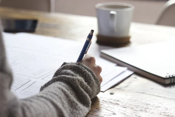 Online grade calculator showing weighted assignment scores and final course grade for students