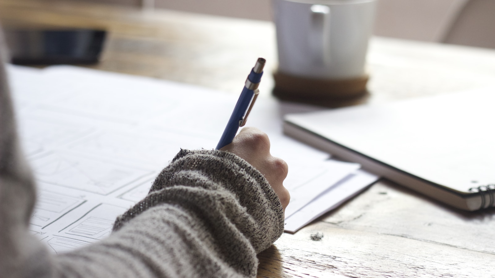 Actor studying script using active recall techniques with focused concentration