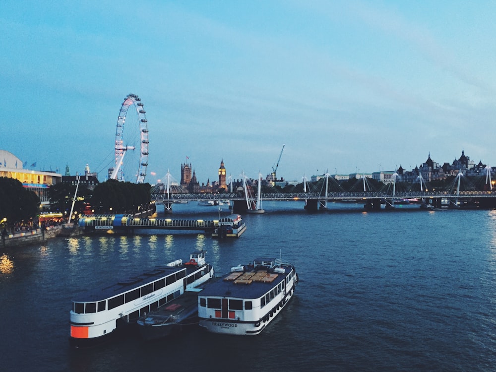 two white passenger boats