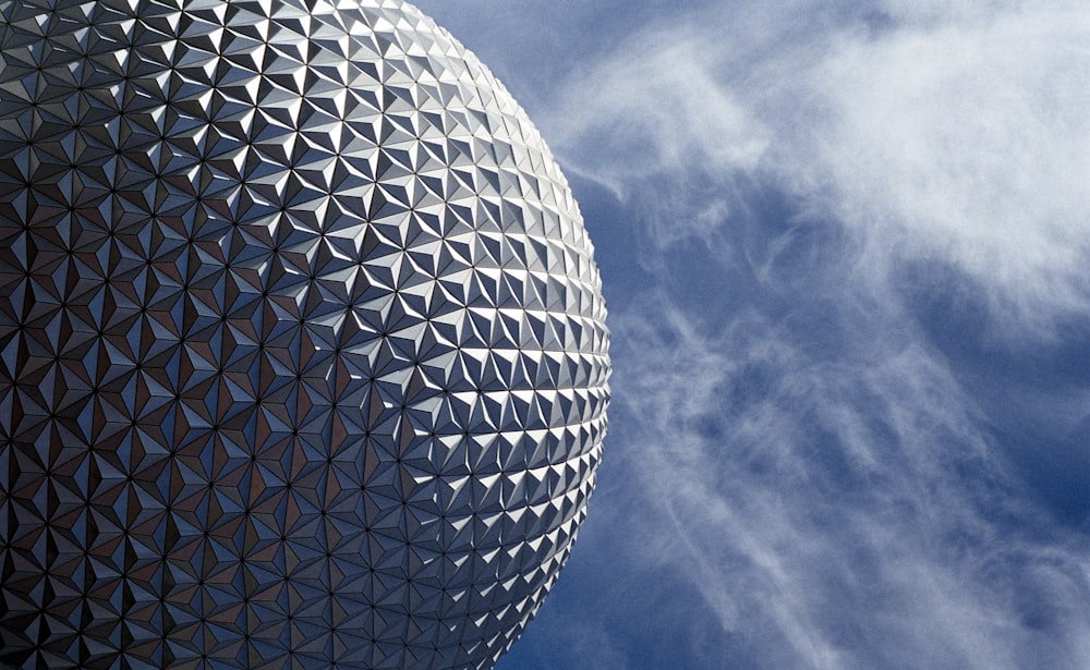 A large sphere covered with triangle-shaped tiles