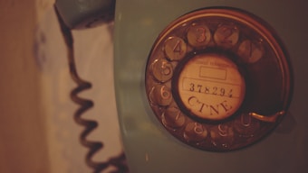 SIM card on desk with phone
