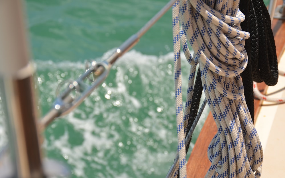 white and blue rope on string