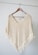 white v neck shirt on brown clothes hanger