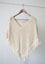 white v neck shirt on brown clothes hanger