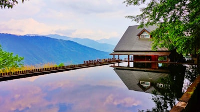 Visiting Taiwan's Wuling Farm offers the iconic Snow Mountain trailhead and serene alpine pond, a scenic and popular destination for nature enthusiasts.