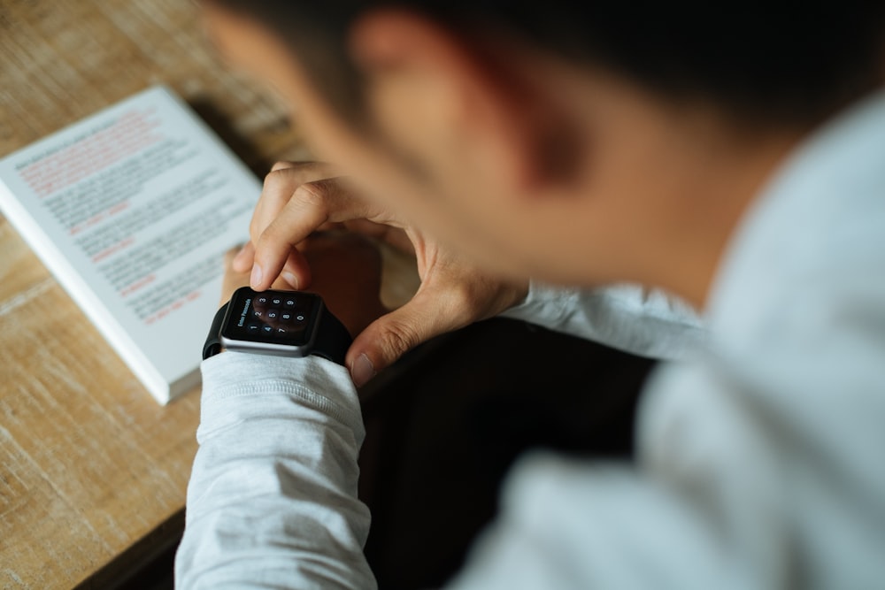 shallow focus photography of smartwatch