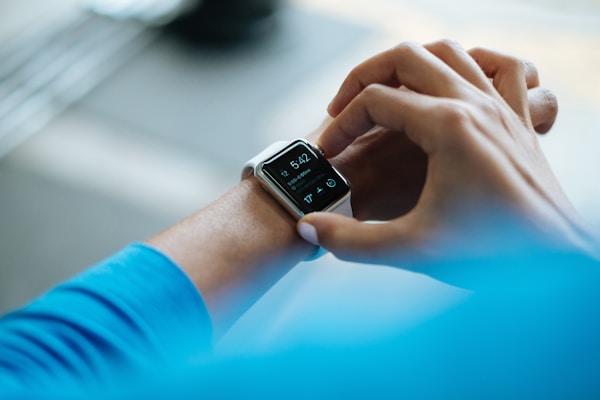 Young Indian man wearing Apple Watchby Luke Chesser