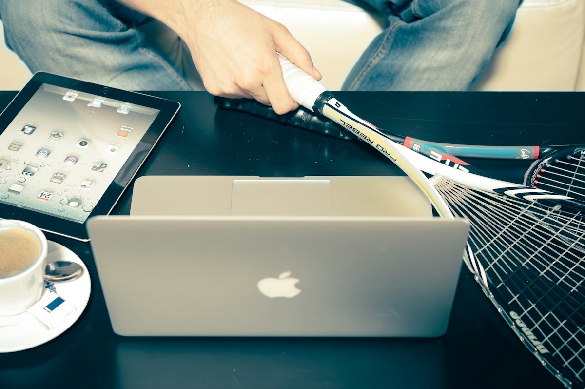A silver laptop computer on a desk