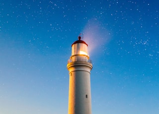 white concrete lighthouse