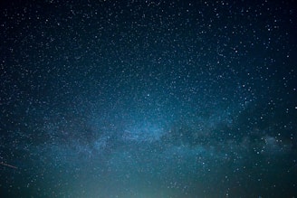 the night sky is filled with stars and bright lights