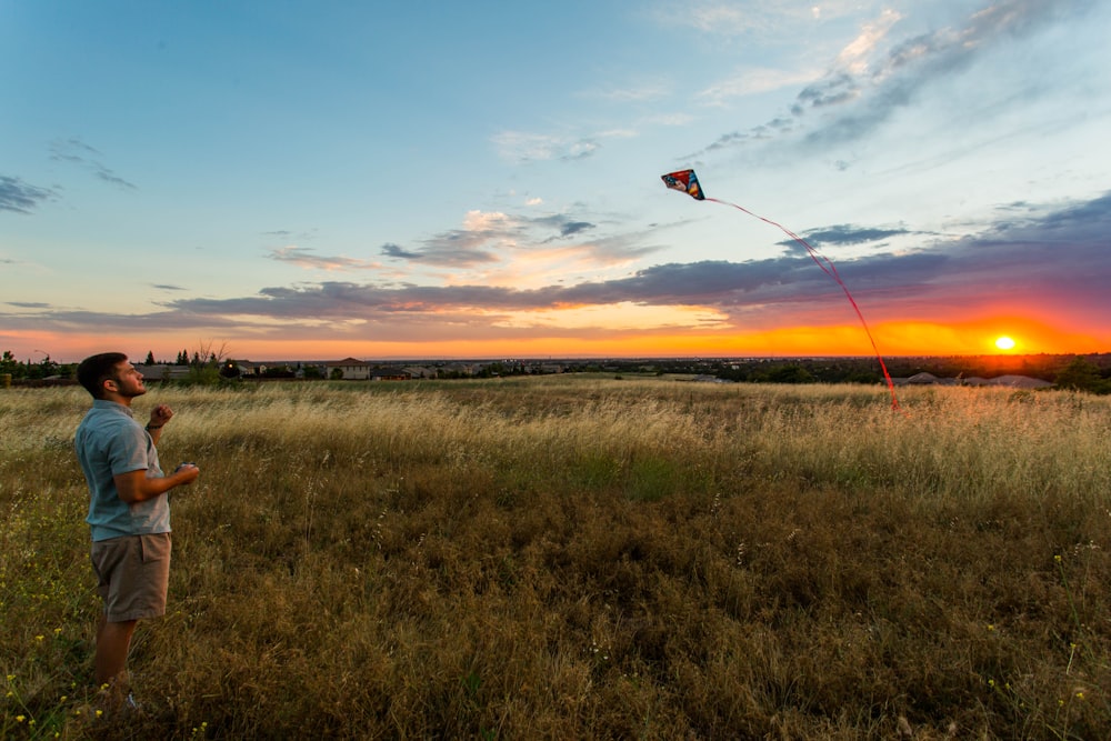 man flying kite