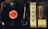 A vintage record player with a spinning vinyl record on the left side. The record has a bright red label. To the right, an analog radio tuner with dials for selector, balance, tone, loudness, and tuning is visible. The tuner displays frequencies with an illuminated red indicator.