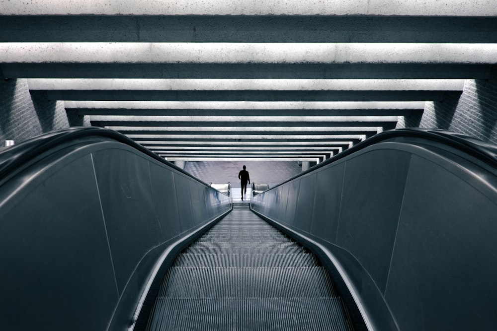 man on escalator turned on