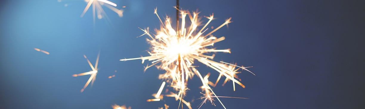 person holding sparkler