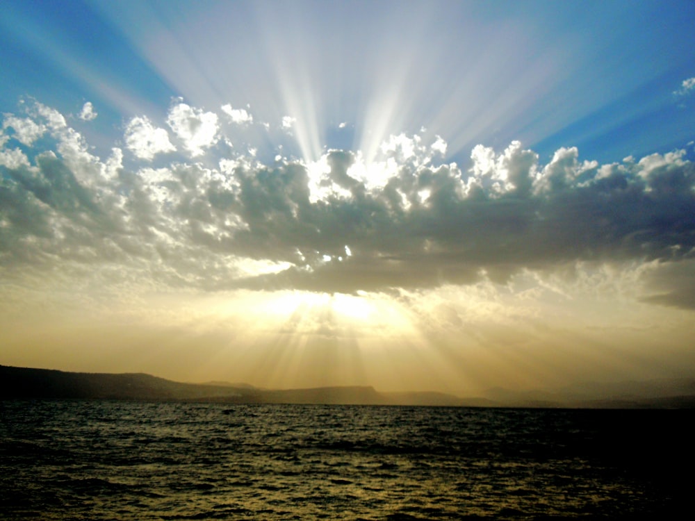 ocean under white clouds