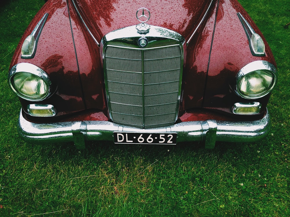 classic red Mercedes-Benz car with DL6652 license plate