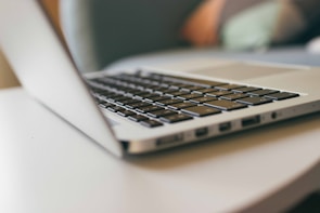 Close-up of a high-tech laptop on a desk.