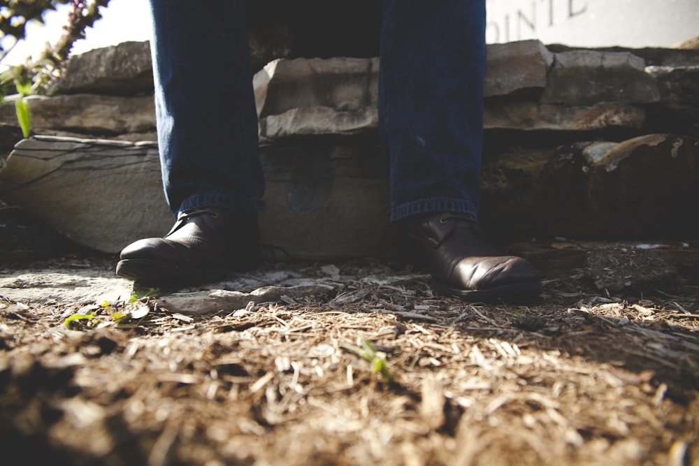 person standing on gray surface