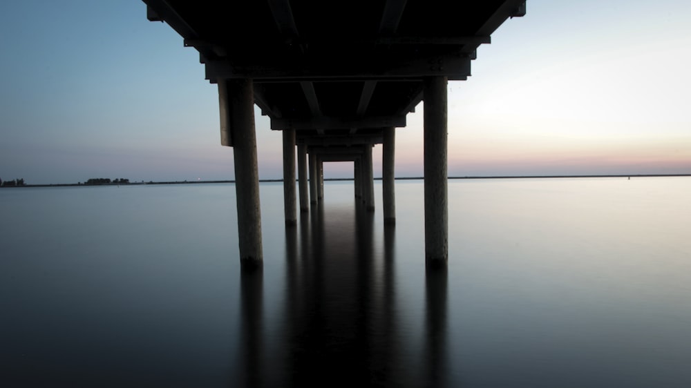 wooden dock on body of water