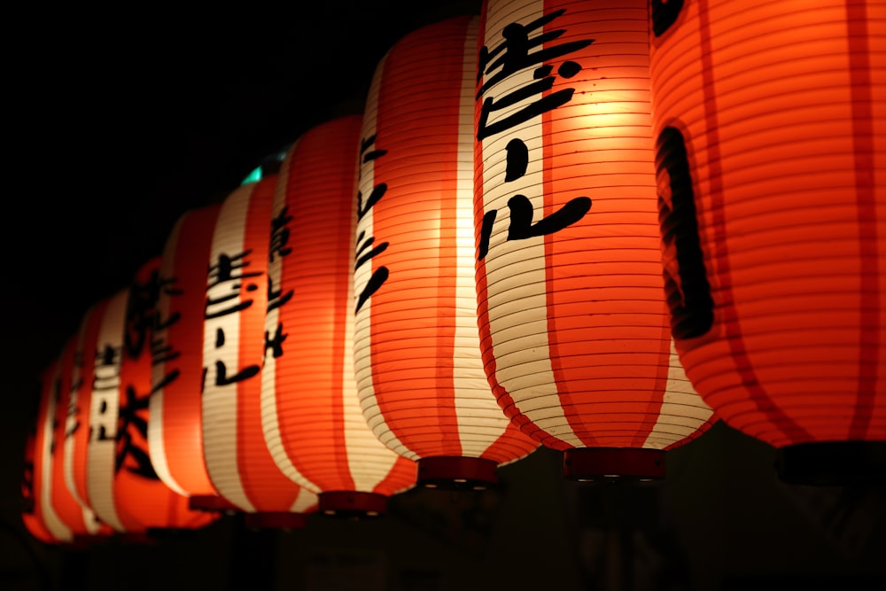 selective focus photography of lit paper lanterns