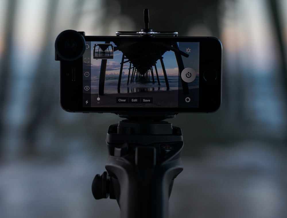 A smartphone on a tripod.