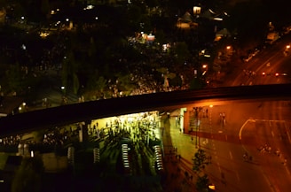 An aerial view of a large event with security presence.