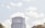 photography of high-rise building with clouds