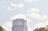 photography of high-rise building with clouds