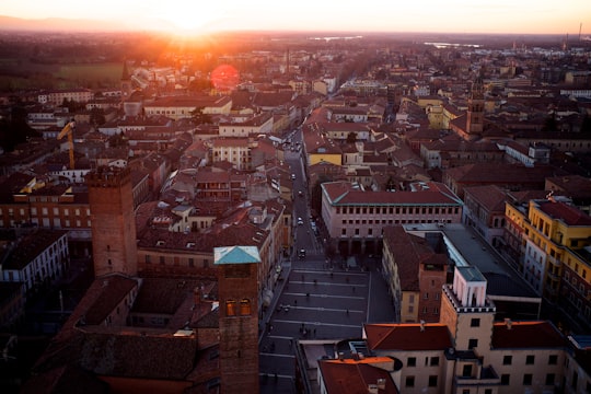 aerial photo of buildings at night in Torrazzo Italy