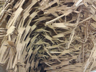 Decorative cardboard art piece showing intricate layering and texture.