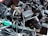 A tangled assortment of various power adapters and electrical cords, including connectors and plugs, all in a chaotic pile.