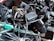 A tangled assortment of various power adapters and electrical cords, including connectors and plugs, all in a chaotic pile.