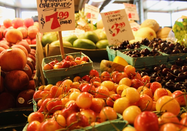 red and yellow apple fruits on display