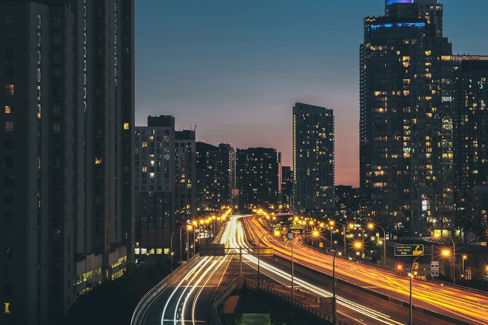 time lapse photography of highway during nighttime