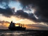 ship sailing during sunset