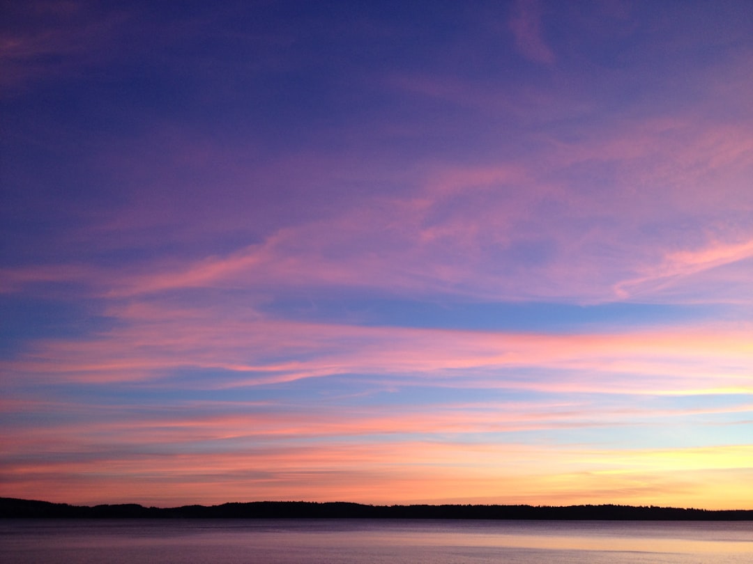orange and blue sky during golden hour,