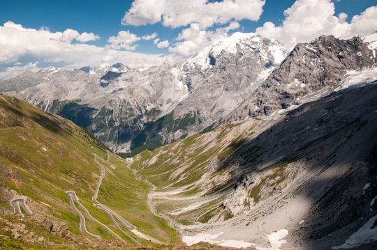 mountains under white cloudy sky in Stelvio National Park Italy