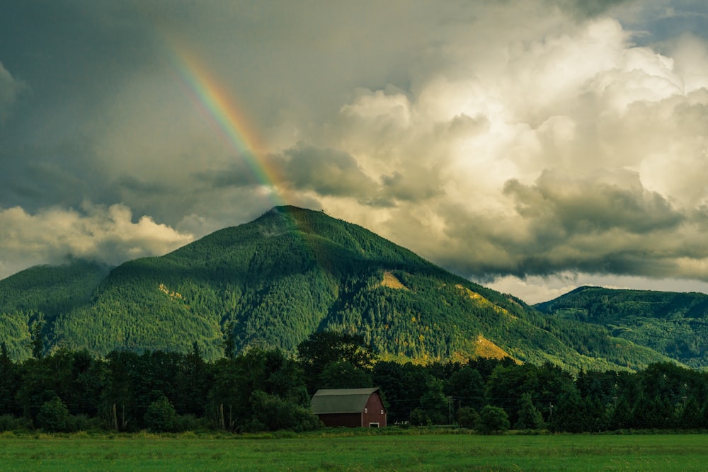 barn near mountain photo