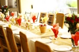 Restaurant setup prepared for a family celebration with elegant table settings.