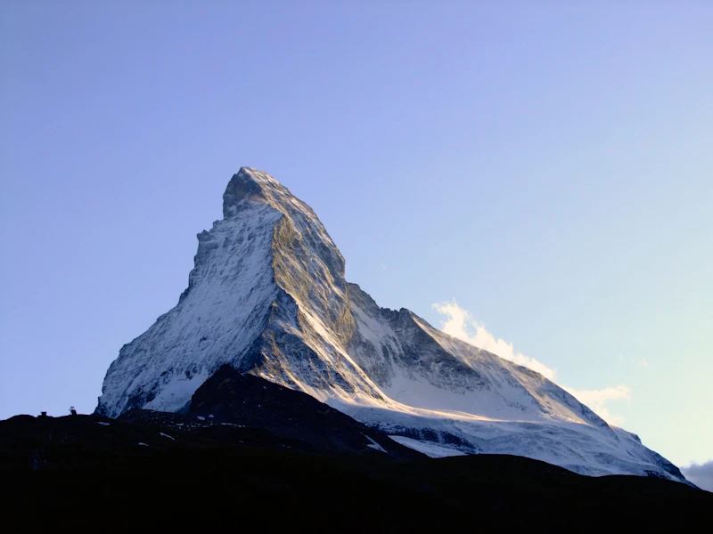 The jagged summit of the Matterhorn at sunset above Zermatt