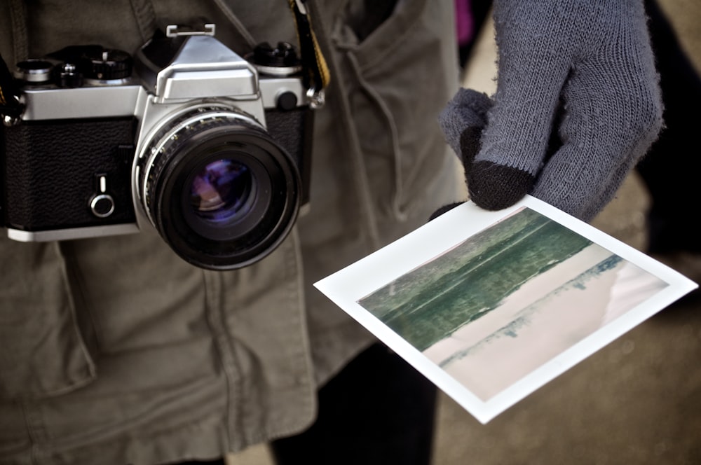 person holding photo